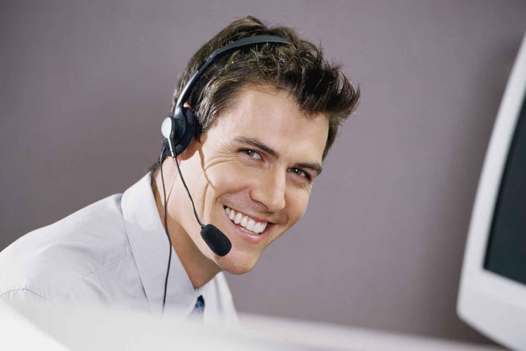 A phone support worker looking extremely happy