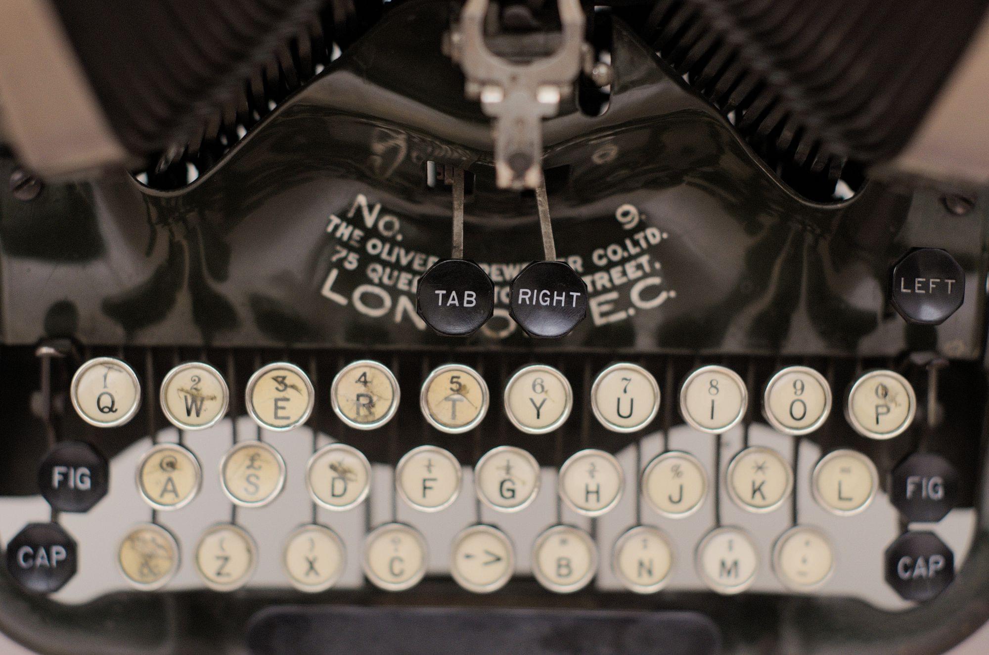 A photo looking down upon the keys of an old typewriter