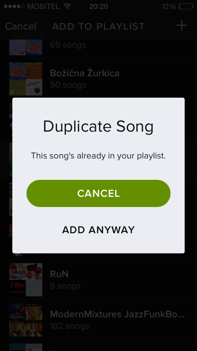 A prompt indicating that a song already exists in the playlist, and asking the user if they want to continue or cancel adding the song
