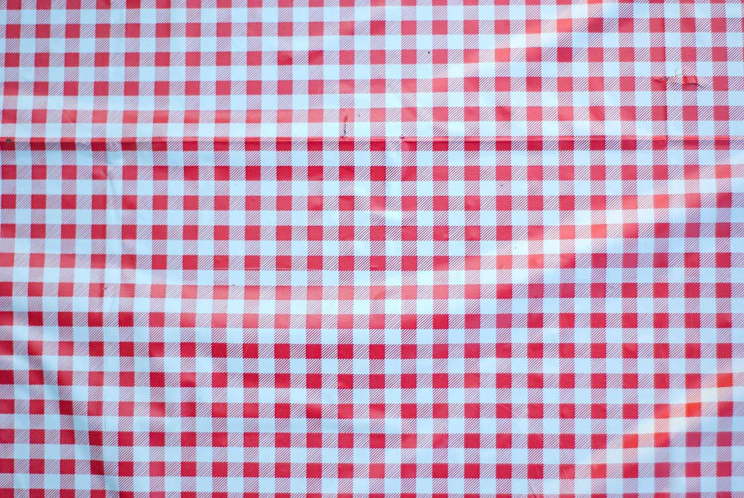 A red and white picnic blanket